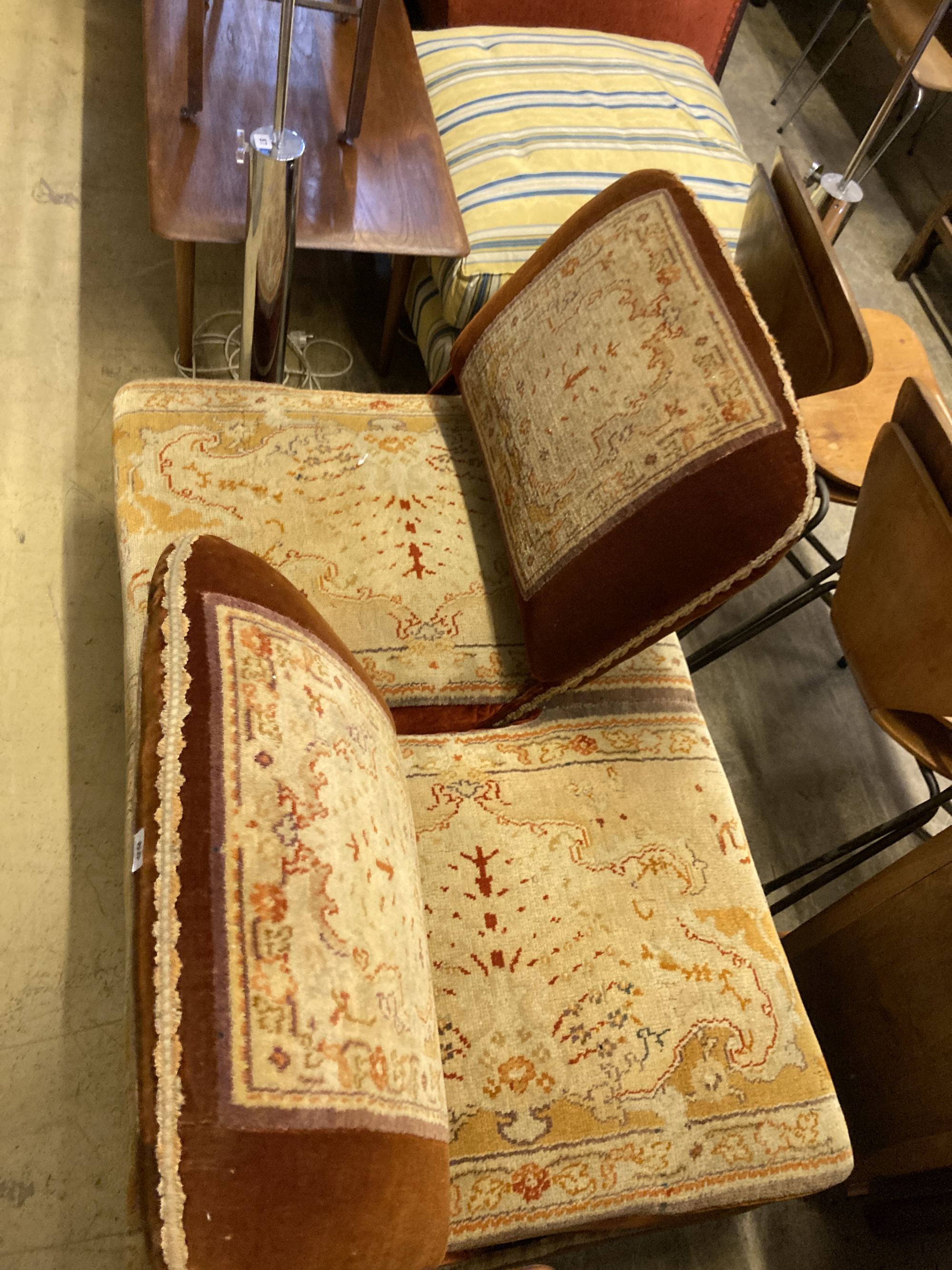 A Victorian carpet upholstered conversation seat with hinged adjustable back rests, length 134cm, depth 86cm, height 84cm